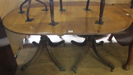 George III style solid mahogany extending dining table(-)